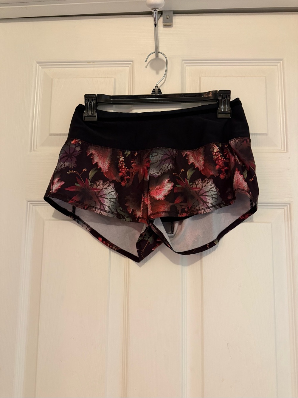 oiselle Black Floral Run Shorts with Red-Pink Leaf Print